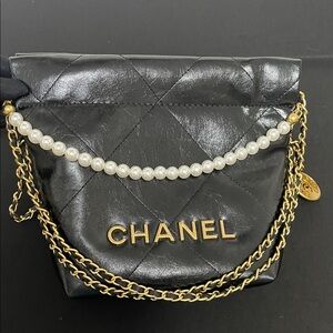 CC Black Quilted Shoulder Bag with Gold and Pearl Accents